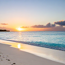 Caribbean Holidays, February Diving, A peaceful white-sand beach and turquoise sea at sunset on Providenciales in the Turks and Caicos Islands