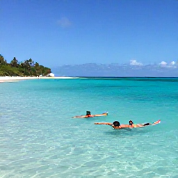 Caribbean Holidays, February Holidays, Adults snorkelling in clear turquoise water beside a quiet Saint Barth&eacute;lemy beach on a sunny February morning