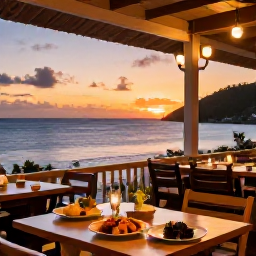 Caribbean Holidays, February Holidays, Outdoor Caribbean restaurant at sunset in Saint Vincent and the Grenadines, with local dishes, soft lights and ocean views