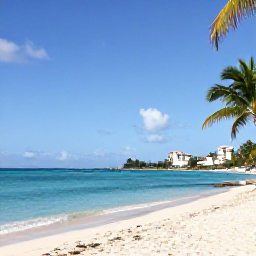 Caribbean Holidays, February Holidays, Sunny Caribbean beach on Saint Martin with clear turquoise water, palm trees and a relaxed February holiday atmosphere
