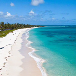 Caribbean Holidays, February Instagram Hotspots, Aerial photograph of Grace Bay Beach in Turks and Caicos, turquoise water, white sand, bright February sunshine