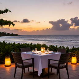 Caribbean Holidays, Grenada Adults Only, Elegant adults-only resort terrace in Grenada at sunset, dining table, ocean view and warm lantern light
