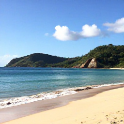 Caribbean Holidays, Grenada Adventure Holidays, A bright June morning on Grand Anse Beach in Grenada, with calm turquoise water, golden sand and green hills in the background