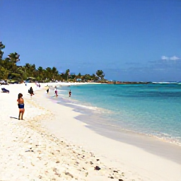 Caribbean Holidays, Grenada All Inclusive, Grand Anse Beach in Grenada with soft white sand, clear blue water and visitors enjoying a relaxed sunny afternoon