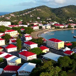 Caribbean Holidays, Grenada City Breaks, A colourful aerial view of St George's, Grenada, with its harbour, red-roofed buildings and green hills in warm June sunshine
