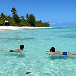 Caribbean Holidays, Grenada Family Holidays, Children and parents snorkelling in calm shallow water near Grenada, colourful tropical fish and a safe sandy cove