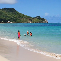 Caribbean Holidays, Grenada Family Holidays, Families swimming and snorkelling in calm turquoise water at Grand Anse Beach, Grenada, with a gentle sandy shoreline and green hills in the background