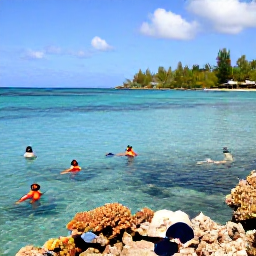 Caribbean Holidays, Grenada February Holidays, Snorkellers exploring clear Caribbean water near Grenada, with colourful tropical fish, coral and a sunny coastline in the background
