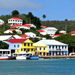 Caribbean Holidays, Grenada Holidays January, Colourful St George's harbour in Grenada with hillside buildings, fishing boats and visitors exploring the waterfront