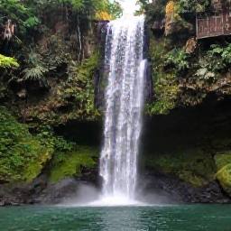 Caribbean Holidays, Grenada in July, A scenic view of Annandale Falls in Grenada, with a waterfall dropping into a natural pool surrounded by tropical vegetation