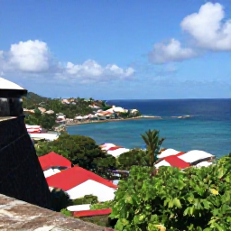 Caribbean Holidays, Grenada Instagram Spots, Scenic viewpoint at Fort Frederick in Grenada overlooking St George's harbour, red roofs and blue Caribbean sea