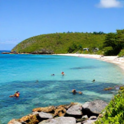 Caribbean Holidays, Grenada Nature Holidays, Grenada coastline with clear turquoise water, green headlands, quiet sandy beach and snorkellers exploring a healthy reef