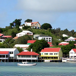 Caribbean Holidays, Grenada September Holidays, Colourful St George's harbour and hillside buildings in Grenada under tropical skies, with local boats and lush green surroundings