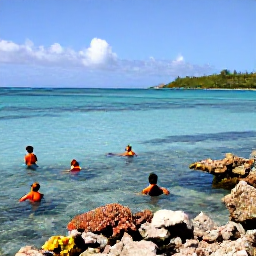 Caribbean Holidays, Guadeloupe All Inclusive, Visitors swimming and snorkelling in clear waters beside a colourful coral reef on the Guadeloupe coast