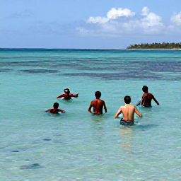 Caribbean Holidays, Guadeloupe April Holidays, Visitors swimming and snorkelling in clear Caribbean water near Guadeloupe, with colourful fish, a coral reef and a sunny coastline