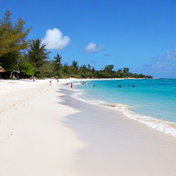 Caribbean Holidays, Guadeloupe Beach Holidays, Grande-Terre coastline in Guadeloupe showing a broad sandy beach, clear Caribbean sea, snorkellers and green tropical scenery