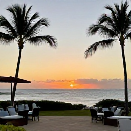 Caribbean Holidays, Guadeloupe December, A romantic Guadeloupe sunset over the sea viewed from an all-inclusive resort terrace, with warm evening light and palm silhouettes