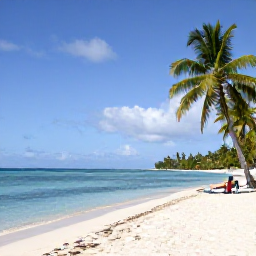 Caribbean Holidays, Guadeloupe Holidays, White sandy beach at Sainte-Anne in Guadeloupe with palm trees, calm turquoise water and sunbathers