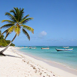 Caribbean Holidays, Guadeloupe Holidays, White sandy beach on Grande-Terre with palm trees, calm turquoise water and colourful Caribbean fishing boats