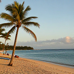 Caribbean Holidays, Guadeloupe Tours, A relaxed August afternoon at a Guadeloupe beach, with palm trees, golden sand, calm turquoise water and visitors enjoying the coast