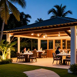 Caribbean Holidays, Haiti Adults Only May, Elegant adults-only resort restaurant and evening terrace in Haiti, with couples dining beside softly lit tropical gardens