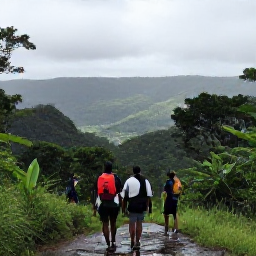 Caribbean Holidays, Haiti Adventure, Travellers hiking through lush Haitian mountain scenery after light rain, with tropical vegetation and distant valleys