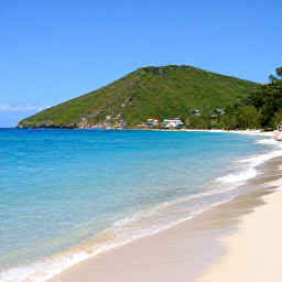 Caribbean Holidays, Haiti February Holidays, Beautiful Haitian coastline in February with clear blue Caribbean water, sandy beach and green hills in the distance