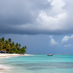 Caribbean Holidays, Haiti in August, A peaceful Haitian coastline in August with turquoise water, palm trees, a small fishing boat and clouds clearing after a tropical shower
