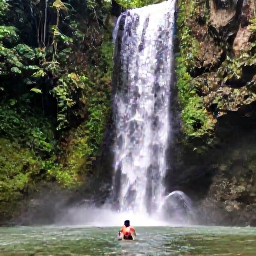 Caribbean Holidays, Jamaica Backpacking November, Backpacker swimming beneath a waterfall in lush Jamaican rainforest near Ocho Rios, surrounded by tropical greenery