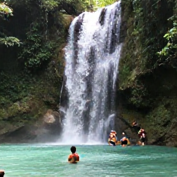 Caribbean Holidays, Jamaica December Adventures, Jamaican waterfall in December with visitors climbing through clear pools and lush tropical forest