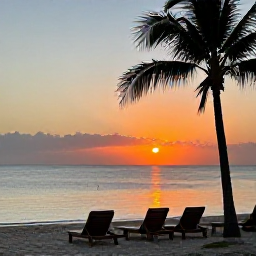 Caribbean Holidays, Jamaica February Tours, Relaxed Caribbean beach in Jamaica at sunset with comfortable loungers, calm water and palm trees