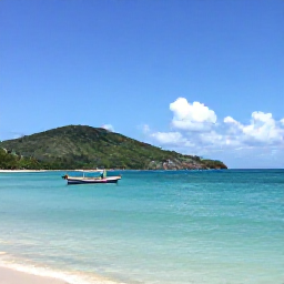 Caribbean Holidays, Jamaica Fishing May, A bright Jamaican coastline in May with a small fishing boat on calm turquoise water and green hills beyond