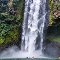 Caribbean Holidays, Jamaica Holidays April, Travellers swimming beneath the waterfalls at Dunn's River Falls in Jamaica, surrounded by tropical greenery