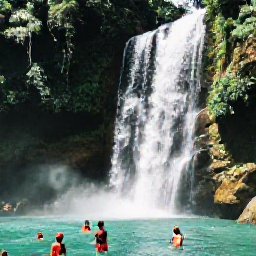 Caribbean Holidays, Jamaica Instagram Spots, Turquoise waterfall pool and tropical forest at Dunn&rsquo;s River Falls near Ocho Rios, Jamaica, with visitors climbing the falls safely