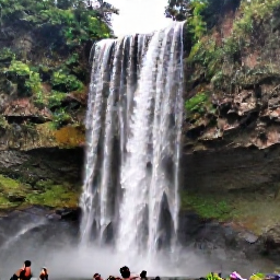 Caribbean Holidays, Jamaica Nature Holidays, Jamaica&rsquo;s Dunn&rsquo;s River Falls surrounded by tropical greenery, with visitors carefully climbing the cascades under a bright November sky