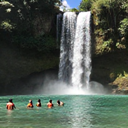 Caribbean Holidays, Jamaica November, Visitors swimming in the clear waters at Dunn's River Falls near Ocho Rios, Jamaica