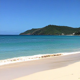 Caribbean Holidays, Jamaica Safari Holidays, Relaxed Jamaican beach beside a safari holiday base, with turquoise water, soft sand and green hills in the distance
