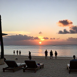 Caribbean Holidays, Jamaica Tours July, A comfortable Jamaican resort beach at sunset with loungers, calm sea and travellers enjoying an evening stroll