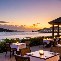 Caribbean Holidays, January Adults Only, Elegant adults-only resort terrace overlooking Charlotte Amalie harbour at sunset, with outdoor dining tables and soft lights