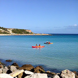 Caribbean Holidays, January Adventures, Kayakers paddling along a calm turquoise bay beside Cura&ccedil;ao&rsquo;s rocky coastline