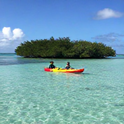 Caribbean Holidays, January Adventures, Visitors kayaking across clear shallow water beside a mangrove island in Turks and Caicos