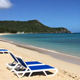 Caribbean Holidays, January Beaches, Relaxed beach scene at Frigate Bay, Saint Kitts, with sun loungers, clear water and green hills in the background