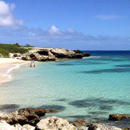 Caribbean Holidays, January Cura&ccedil;ao Holidays, Secluded Cura&ccedil;ao cove with clear shallow water, snorkellers, white sand and rugged Caribbean coastline