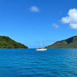 Caribbean Holidays, January Escapes, Sailing boat passing between tropical islands in the Grenadines, clear blue Caribbean water, green hills and bright January skies