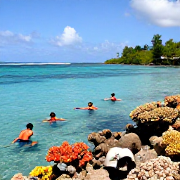Caribbean Holidays, January Grenada, Snorkellers exploring clear Caribbean water near colourful coral and tropical fish off the coast of Grenada