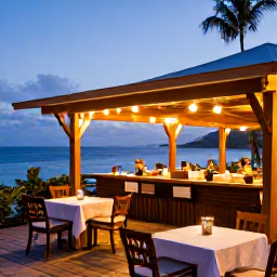 Caribbean Holidays, January Honeymoons, Elegant open-air restaurant overlooking the Caribbean Sea in Saint Lucia at dusk