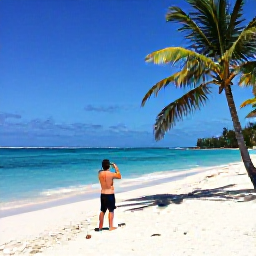 Caribbean Holidays, January Instagram Hotspots, A bright Caribbean beach in January with turquoise water, white sand, palm trees and a traveller taking a photograph