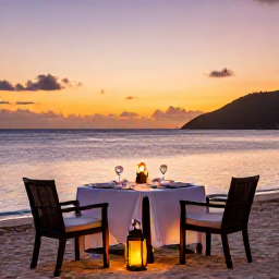 Caribbean Holidays, January Luxury Holidays, Romantic beachfront dining at sunset in Saint Vincent and the Grenadines, with a table for two, soft lantern light and calm sea
