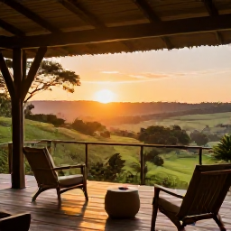 Caribbean Holidays, January Safaris, Comfortable safari lodge deck overlooking a green African valley at sunset, with outdoor chairs and warm natural light