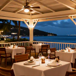 Caribbean Holidays, January Spa Breaks, Elegant outdoor restaurant in Gustavia, Saint Barth&eacute;lemy, with fresh Caribbean cuisine, twinkling lights and evening harbour views